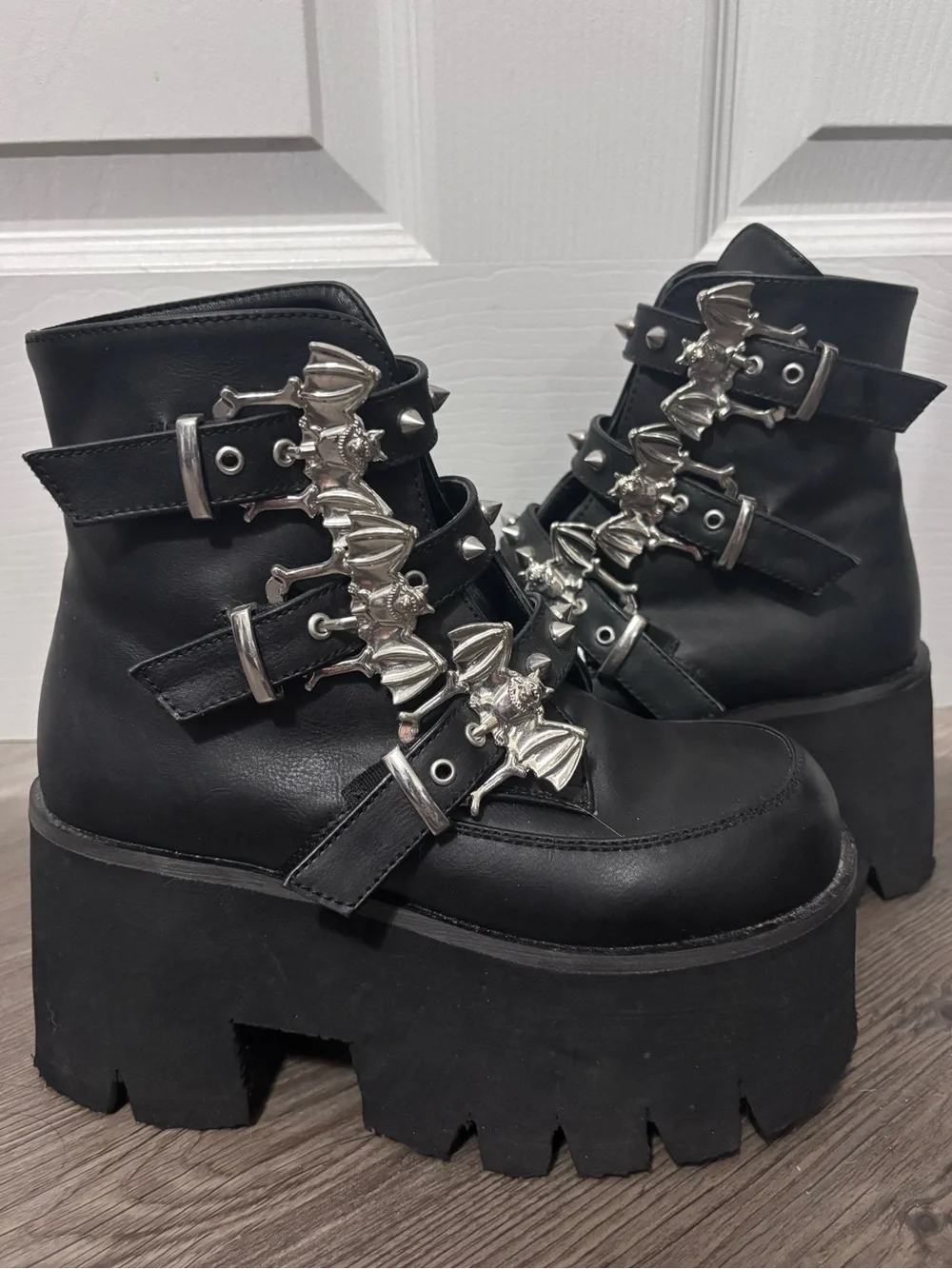 Demonia Ashes-55 Bat Buckle Platform Boots